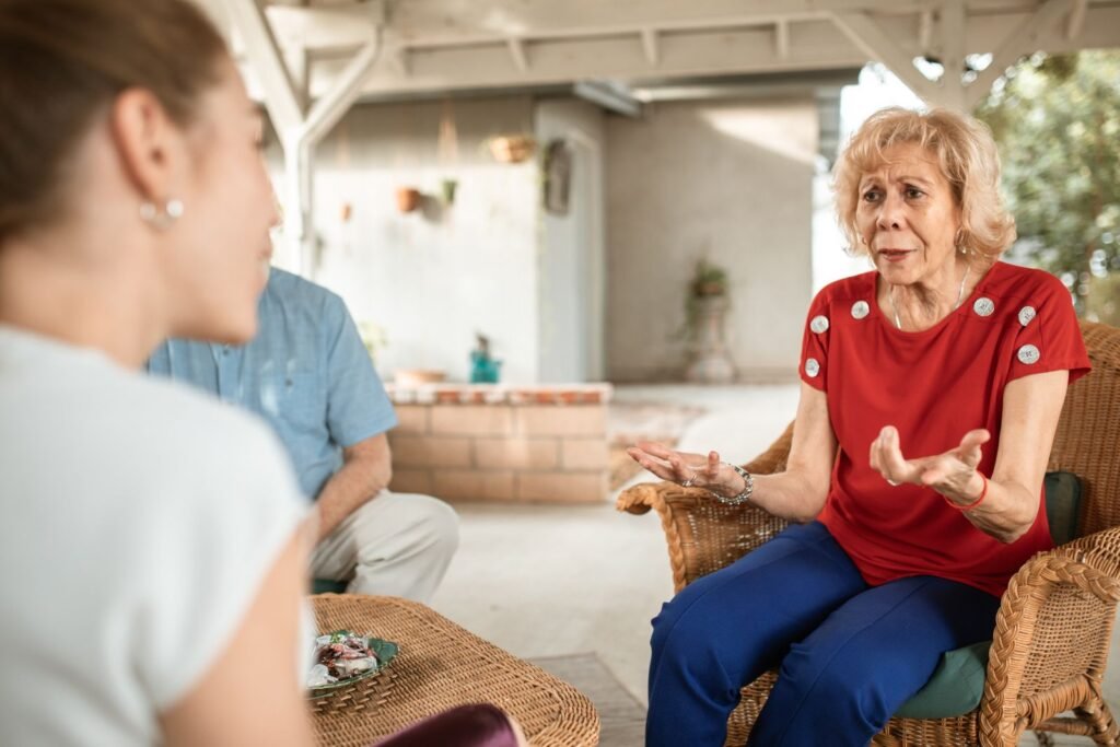 Older woman talking with her adult daughter