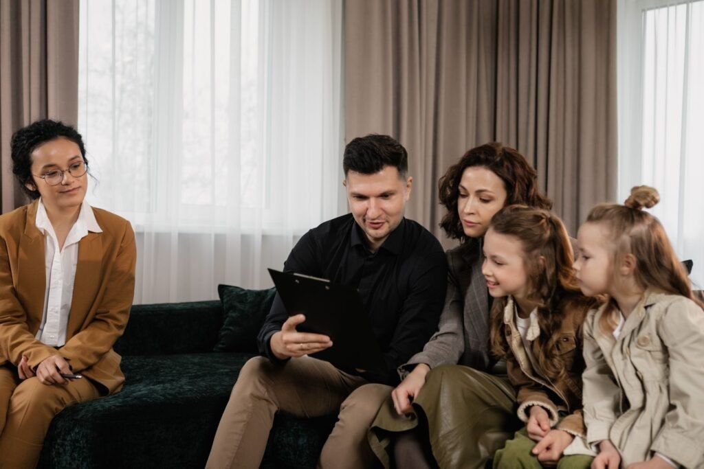 Family reviewing documents with an adviser